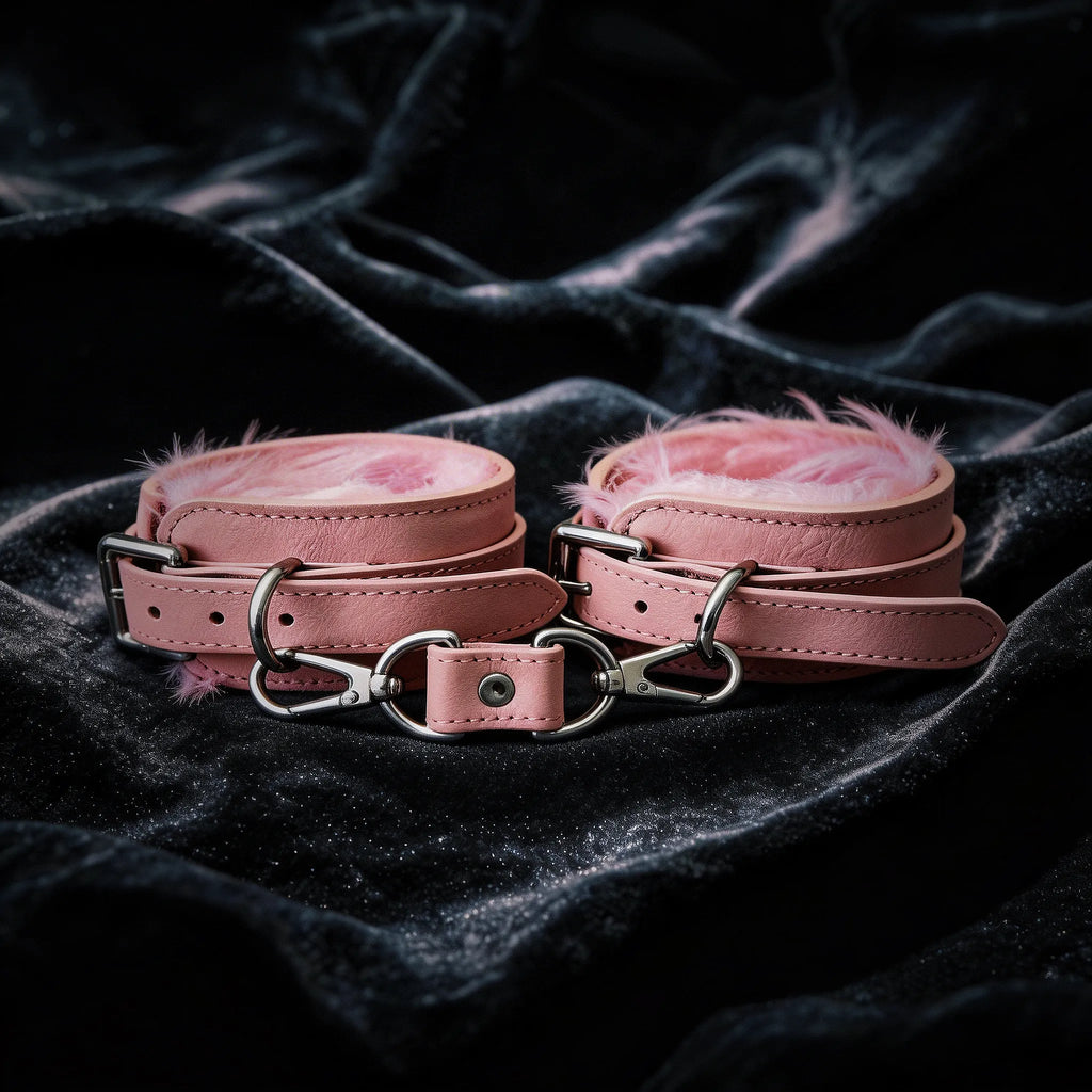 Blush Bond leather wrist cuffs front view with blush leather exterior and central connector tab