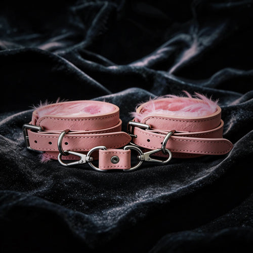 Blush Bond leather wrist cuffs front view with blush leather exterior and central connector tab