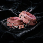 Blush Bond leather wrist cuffs detail view with plush faux-fur lining and soft interior padding