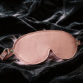 Blush Veil leather blindfold front view in blush top-grain leather with adjustable buckle strap