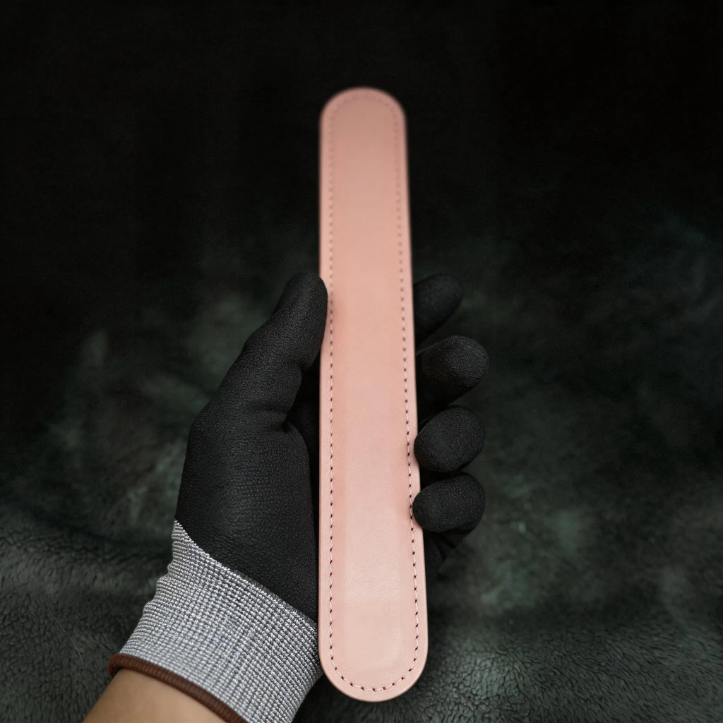 Daisy Hush Slim Leather Spanking Paddle red satin detail showing blush pink leather and daisy accent.