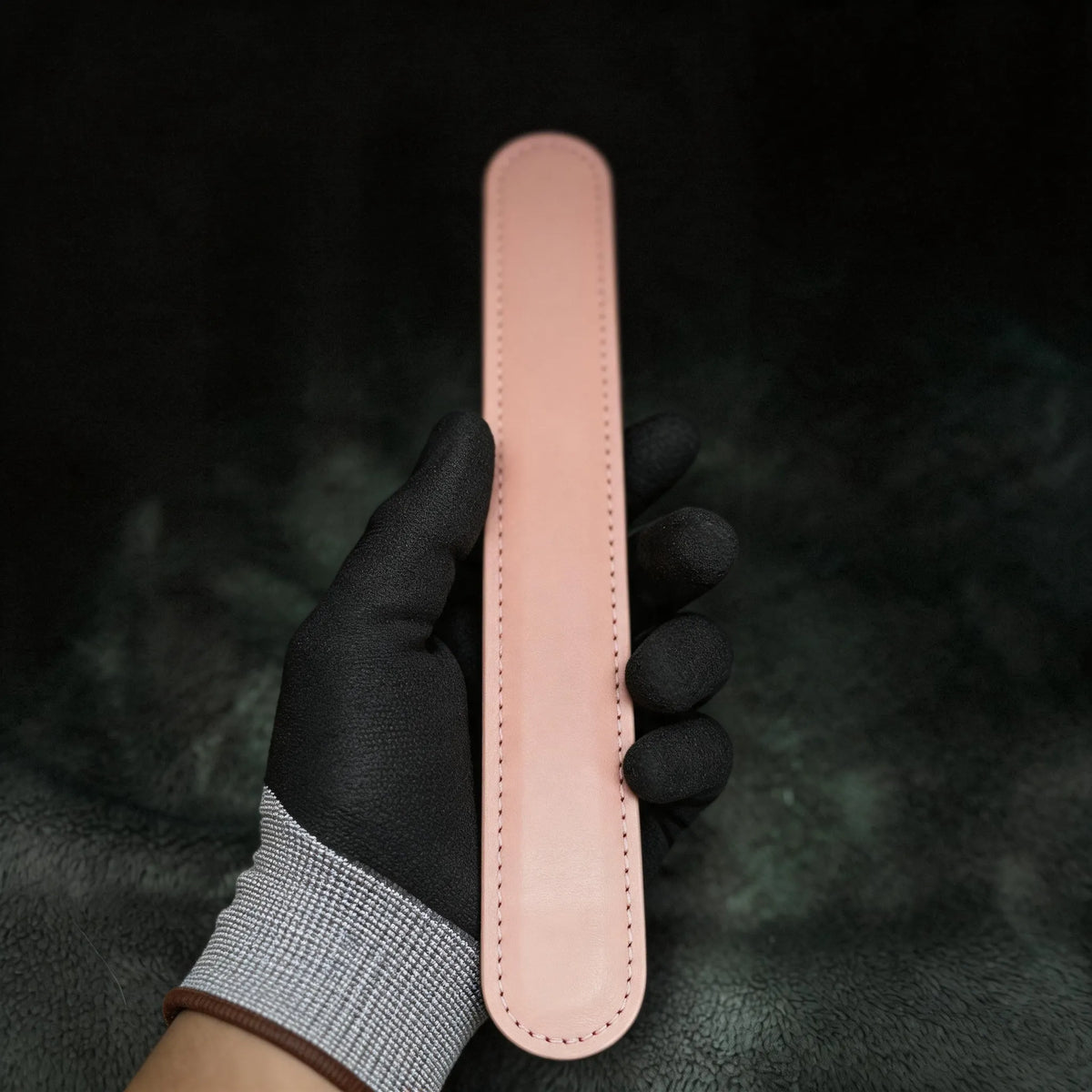 Daisy Hush Slim Leather Spanking Paddle red satin detail showing blush pink leather and daisy accent.