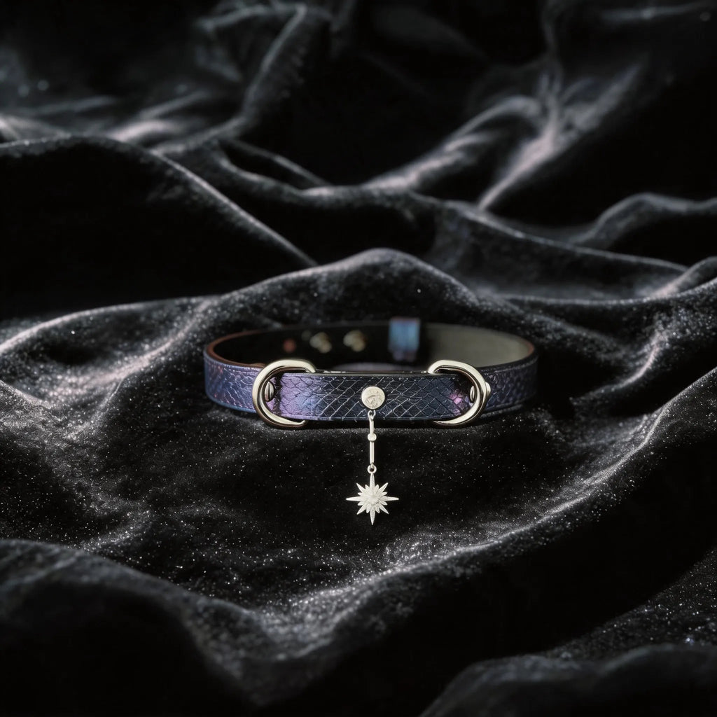 Python Star Pendant Leather Collar purple and black python-textured leather collar on black satin with star pendant.