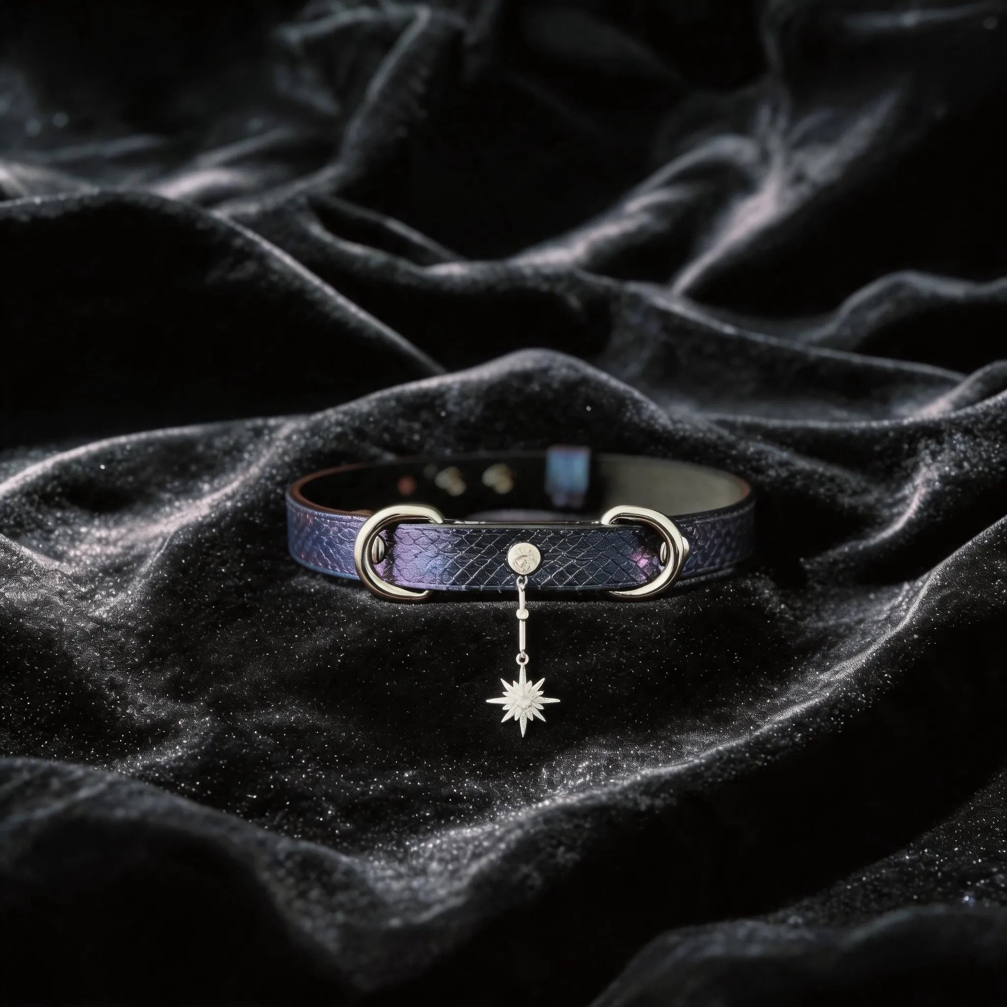 Python Star Pendant Leather Collar purple and black python-textured leather collar on black satin with star pendant.