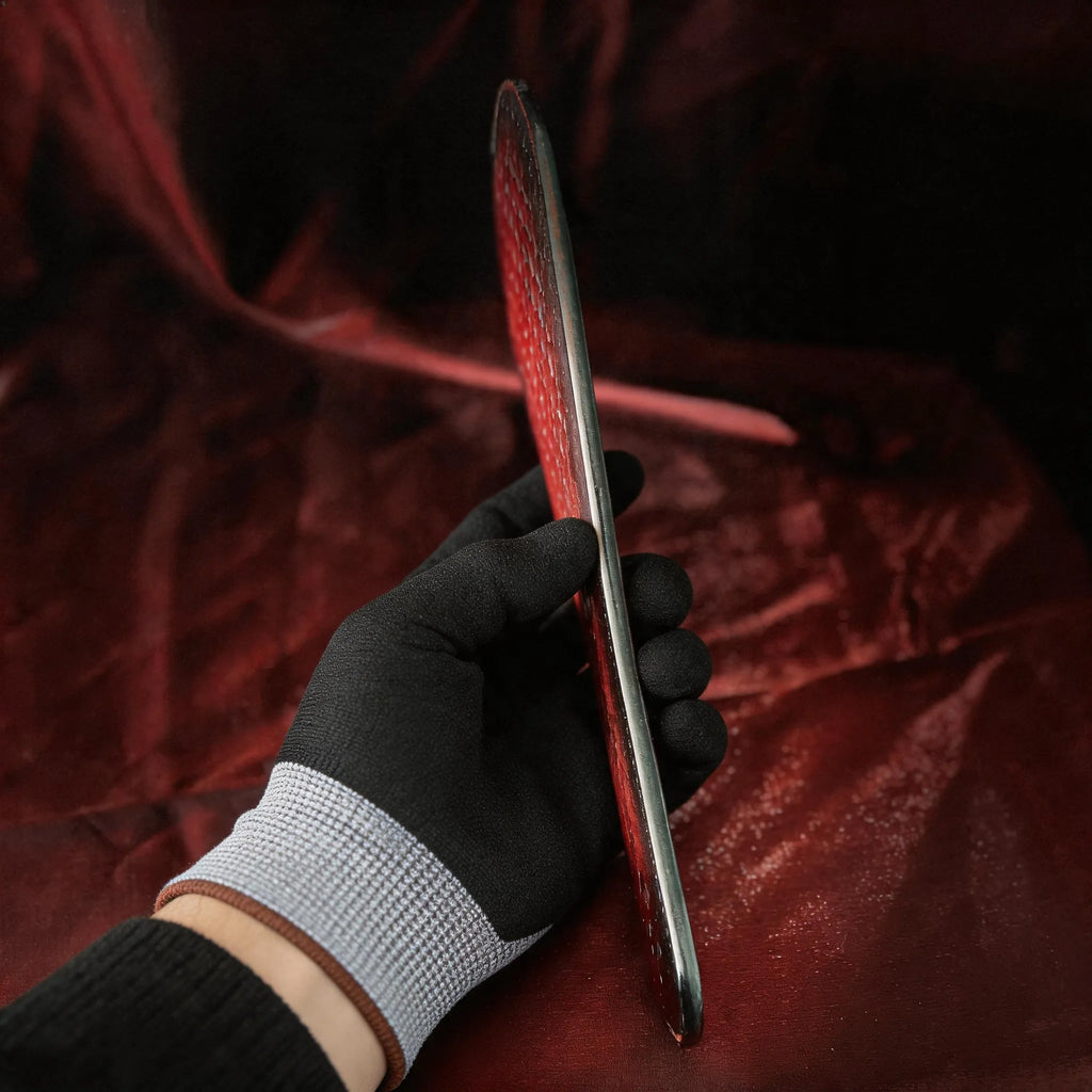 Scarlet Scale Textured Leather Paddle red satin detail showing crimson and black leather and scale texture.