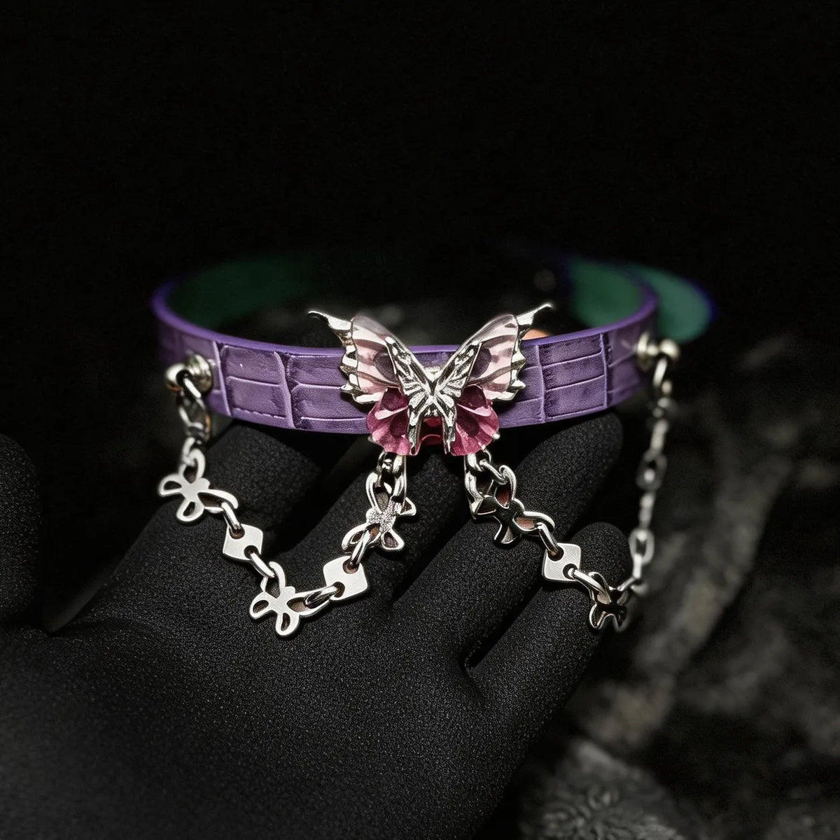 Violet Flutter butterfly leather collar angle view with slim profile and decorative front chain