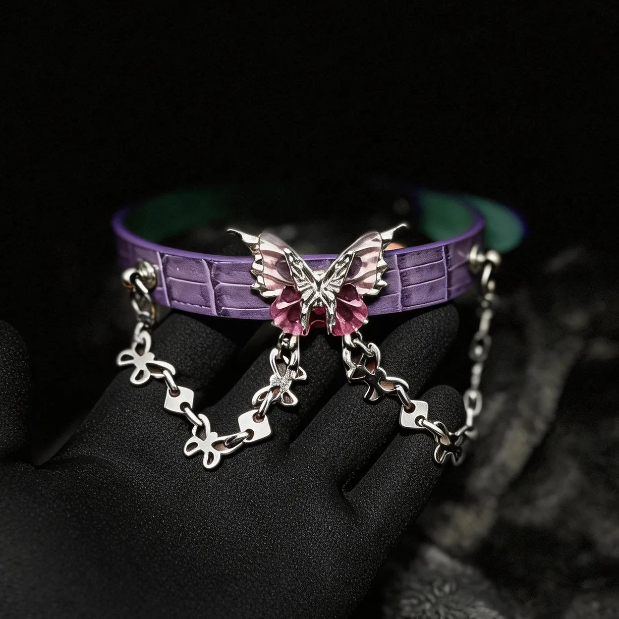 Violet Flutter butterfly leather collar angle view with slim profile and decorative front chain